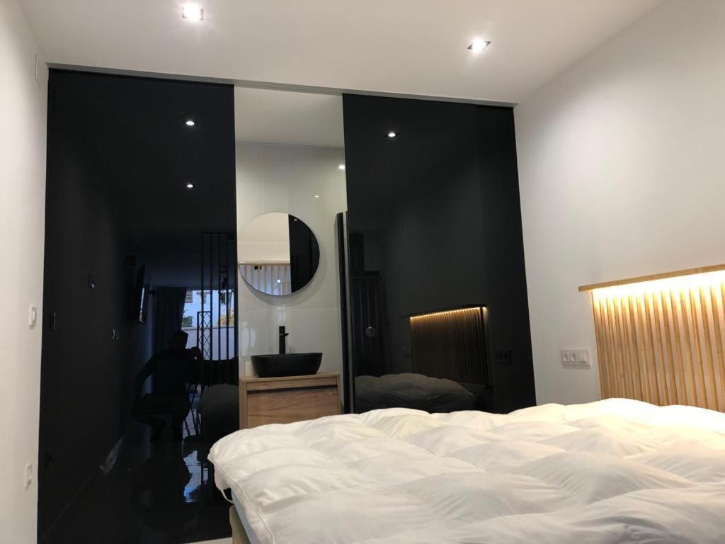 Suite Playamar Con Jacuzzi توريمولينوس المظهر الخارجي الصورة